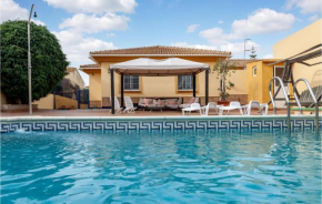 Awesome home in El Portil with Outdoor swimming pool, WiFi and 4 Bedrooms